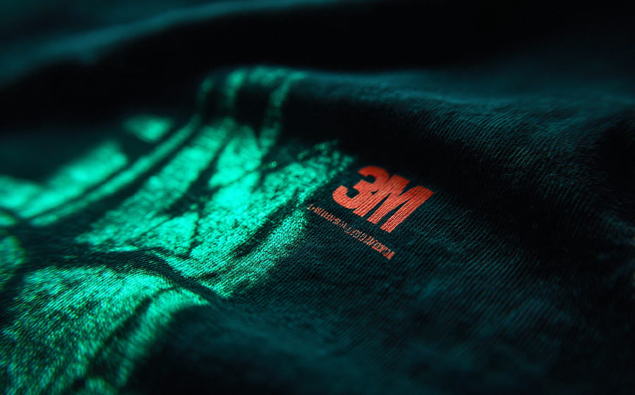 Reflective print jeans manufacturer